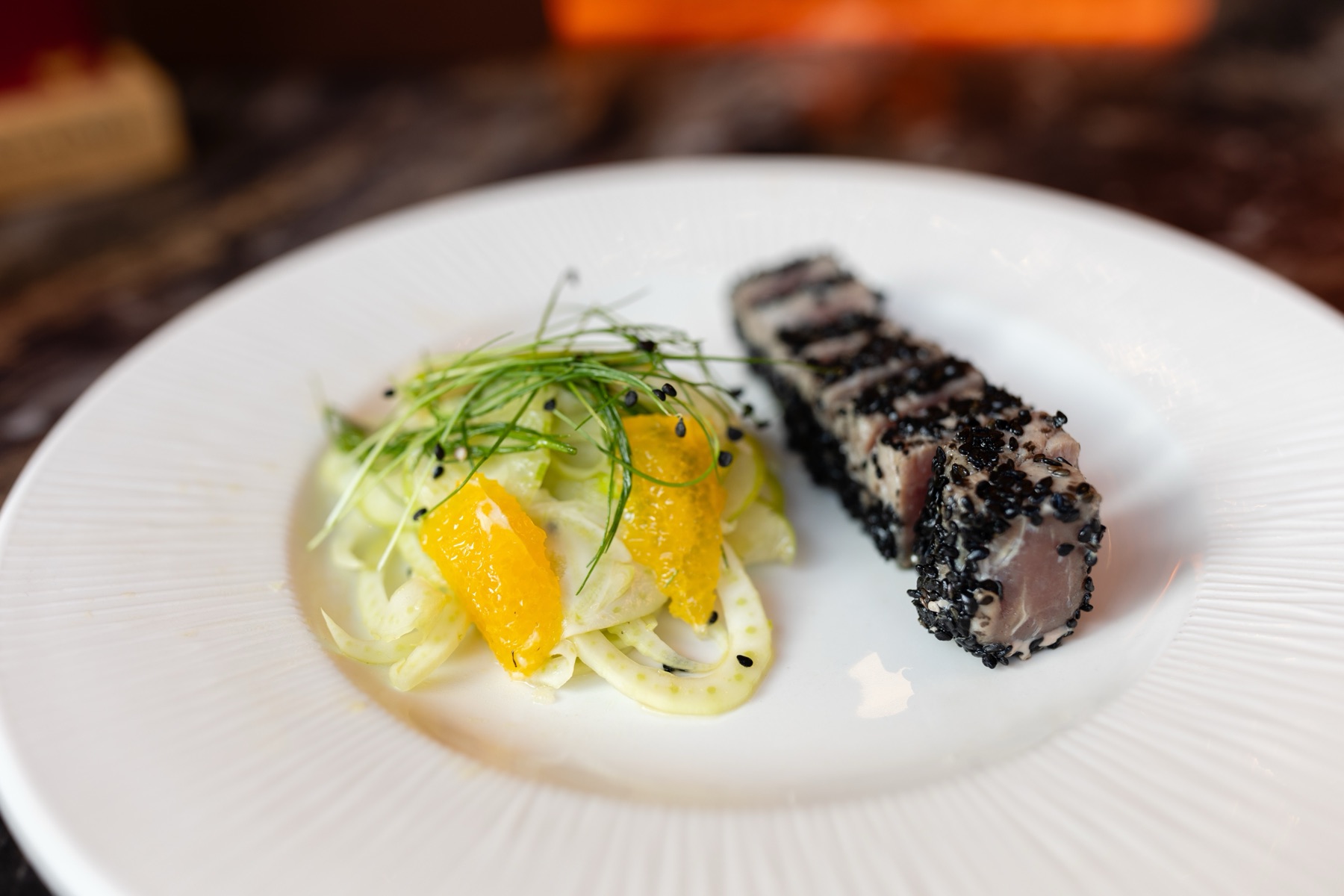 Seared sesame-crusted tuna with shaved fennel and orange